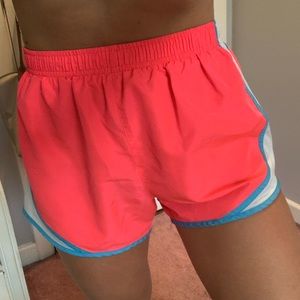 Neon pink running shorts